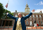 Actor portrays Benjamin Franklin in front of Independence Hall thumbnail